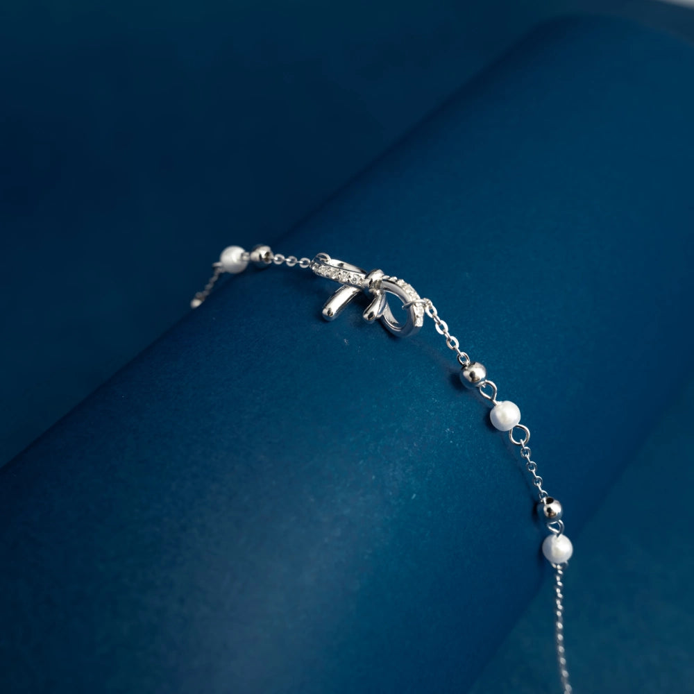 Silver Bow & Pearl Adjustable Bracelet